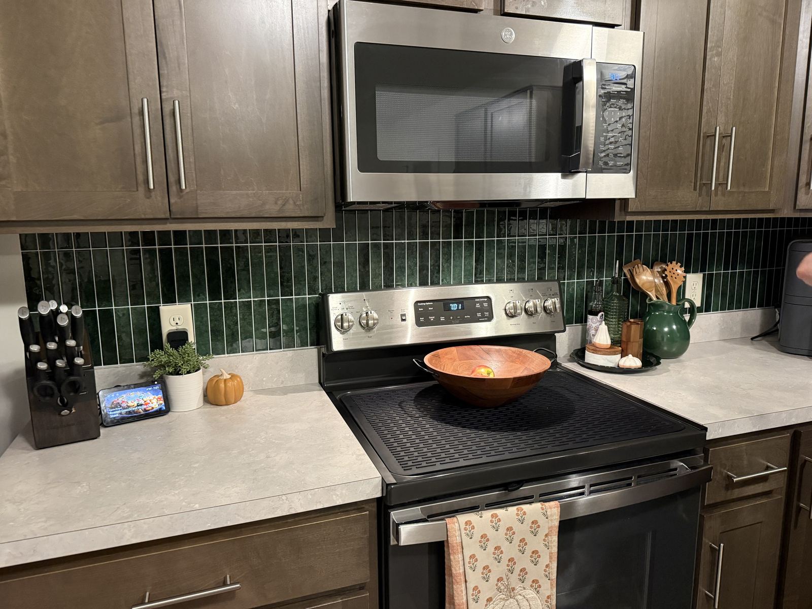 Stacked green tile backsplash behind a stainless stove, installed by Squareline Home Repair in Hanover, PA